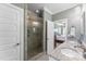 Bathroom with granite double sinks, and a walk-in shower at 244 Alexis Lucia Rd, Alexis, NC 28006