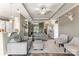 Comfortable living area open to the kitchen, featuring stylish decor, a cozy seating arrangement, and natural light at 244 Alexis Lucia Rd, Alexis, NC 28006