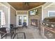 Covered patio featuring a built-in grill, fireplace and outdoor seating at 244 Alexis Lucia Rd, Alexis, NC 28006