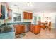Functional kitchen with stainless steel appliances, hardwood cabinets, and breakfast area at 2512 Pimpernel Rd, Charlotte, NC 28213