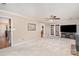 Spacious living room features neutral walls, carpet floors, and access to other areas of the home at 2512 Pimpernel Rd, Charlotte, NC 28213