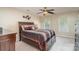 Comfortable bedroom with a ceiling fan, complemented by coordinated decor at 2512 Pimpernel Rd, Charlotte, NC 28213