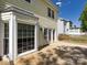 Spacious back deck featuring outdoor lighting and access to the home's interior at 2906 Crescent Knoll Dr, Matthews, NC 28105