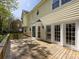 Spacious back deck with access to the home's exterior via double french doors at 2906 Crescent Knoll Dr, Matthews, NC 28105