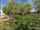Well-maintained back yard featuring a large storage shed and lush green grass at 2906 Crescent Knoll Dr, Matthews, NC 28105