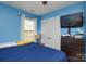 Bedroom with overhead ceiling fan, window, closet, and dresser at 2981 Deep Cove Nw Dr, Concord, NC 28027