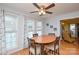 Cozy dining area with wood table and large bright windows at 2981 Deep Cove Nw Dr, Concord, NC 28027
