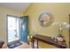 Bright entryway with hardwood floors, decorative mirror, and elegant decor at 2981 Deep Cove Nw Dr, Concord, NC 28027
