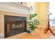 Elegant fireplace with tiled surround and a decorative mantel at 2981 Deep Cove Nw Dr, Concord, NC 28027