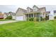 Attractive one-story home featuring a covered porch and manicured landscaping at 2981 Deep Cove Nw Dr, Concord, NC 28027
