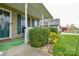 Cozy front porch with vibrant green shrubs and room for seating at 2981 Deep Cove Nw Dr, Concord, NC 28027