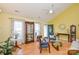 Spacious living room with a vaulted ceiling, hardwood floors, and natural light at 2981 Deep Cove Nw Dr, Concord, NC 28027