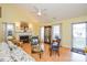 Comfortable living room with a fireplace, hardwood floors, and vaulted ceilings at 2981 Deep Cove Nw Dr, Concord, NC 28027