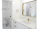 Bright bathroom featuring a quartz countertop, a gold framed mirror and stylish fixtures in a minimalist design at 3500 Manna Ln, Mount Holly, NC 28120