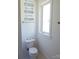 Bright bathroom with framed mirror, decorative wall art and fixtures creating a fresh and stylish space at 3500 Manna Ln, Mount Holly, NC 28120