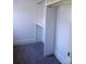 Spacious closet featuring carpet flooring, ample storage with shelves, and hanging rods at 3500 Manna Ln, Mount Holly, NC 28120