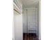 Organized walk-in closet featuring custom shelving and a gold rod offering ample storage with style at 3500 Manna Ln, Mount Holly, NC 28120
