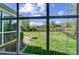 Beautiful backyard view featuring a fire pit, lush lawn, and lake at 4715 Amberside Dr, Rock Hill, SC 29732