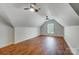 Spacious bonus room with hardwood floors and two ceiling fans at 4715 Amberside Dr, Rock Hill, SC 29732