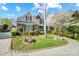 Attractive two-story home boasting a lush lawn, mature landscaping, and a welcoming facade at 4715 Amberside Dr, Rock Hill, SC 29732