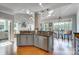 Stunning kitchen features a large island, stainless steel appliances, and opens to a dining area with plenty of light at 4715 Amberside Dr, Rock Hill, SC 29732