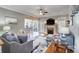 Spacious living room featuring hardwood floors, a fireplace, and ample seating for entertaining guests at 4715 Amberside Dr, Rock Hill, SC 29732