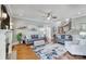 Inviting living room features a fireplace, hardwood floors, and a staircase leading to the upper level at 4715 Amberside Dr, Rock Hill, SC 29732