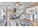 Bright and open living room boasting hardwood floors, stylish decor, and a seamless flow to other living areas at 4715 Amberside Dr, Rock Hill, SC 29732