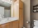 Bathroom featuring a light wood vanity, toilet, and a shower with sliding doors at 475 Delta Dr, Fort Mill, SC 29715