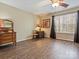 Open bedroom with hardwood floors and a large window for ample natural lighting at 475 Delta Dr, Fort Mill, SC 29715