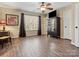 Spacious bedroom showcasing hardwood floors, a ceiling fan, and large windows at 475 Delta Dr, Fort Mill, SC 29715