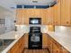Bright kitchen featuring updated appliances, light wood cabinets, and a stylish backsplash at 475 Delta Dr, Fort Mill, SC 29715