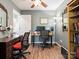 Well-lit office space featuring hardwood floors and multiple workstations at 475 Delta Dr, Fort Mill, SC 29715