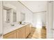 Bright bathroom with dual sink vanity, tub, and shower featuring modern fixtures at 501 Mt. Wesley Church Rd, Hiddenite, NC 28636