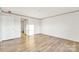 A spacious bedroom with sleek wood-look flooring and ample natural light at 501 Mt. Wesley Church Rd, Hiddenite, NC 28636
