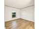 Bedroom with modern flooring, a window letting in natural light, and neutral walls at 501 Mt. Wesley Church Rd, Hiddenite, NC 28636
