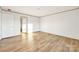A spacious bedroom with sleek wood-look flooring and ample natural light at 501 Mt. Wesley Church Rd, Hiddenite, NC 28636