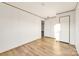 Empty bedroom with modern flooring, two doors, and neutral walls at 501 Mt. Wesley Church Rd, Hiddenite, NC 28636