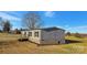Charming single-story home featuring brick foundation and gray vinyl siding at 501 Mt. Wesley Church Rd, Hiddenite, NC 28636
