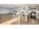 Open concept kitchen with a modern island and stainless steel appliances at 501 Mt. Wesley Church Rd, Hiddenite, NC 28636