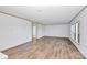 Large open living room features hardwood floors, natural light and transitions to other rooms in the home at 501 Mt. Wesley Church Rd, Hiddenite, NC 28636