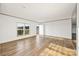 Bright living room with wood-look flooring and neutral walls offers a spacious feel at 501 Mt. Wesley Church Rd, Hiddenite, NC 28636