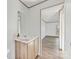 Bathroom featuring wooden vanity and a door leading to bedroom at 525 Mt. Wesley Church Rd, Hiddenite, NC 28636