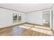 Bright bedroom featuring wood-look floors, neutral paint, and ample natural light at 525 Mt. Wesley Church Rd, Hiddenite, NC 28636