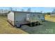 Back exterior showing the deck, new landscaping and the HVAC at 525 Mt. Wesley Church Rd, Hiddenite, NC 28636