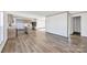 Spacious open floorplan featuring wood-look floors and a modern kitchen at 525 Mt. Wesley Church Rd, Hiddenite, NC 28636