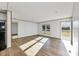 Bright and airy living room with modern wood flooring and natural light at 525 Mt. Wesley Church Rd, Hiddenite, NC 28636