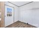 Spacious utility room featuring door to backyard and wire rack storage at 525 Mt. Wesley Church Rd, Hiddenite, NC 28636