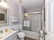 Bathroom with shower, tub and neutral-toned vanity at 5301 Greyfriar Ct, Waxhaw, NC 28173
