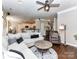 Cozy living room with hardwood floors, stylish decor and a ceiling fan at 5301 Greyfriar Ct, Waxhaw, NC 28173